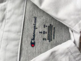 Polo Champion manga larga gris talla S.