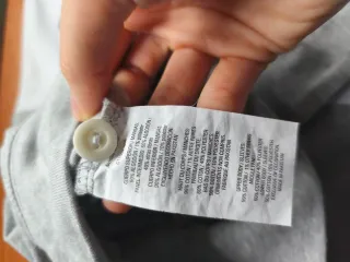 Polo Champion manga larga gris talla S.