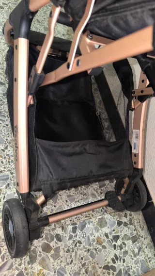 Silla de paseo negra y rosa