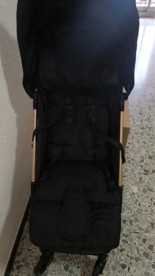Silla de paseo negra y rosa