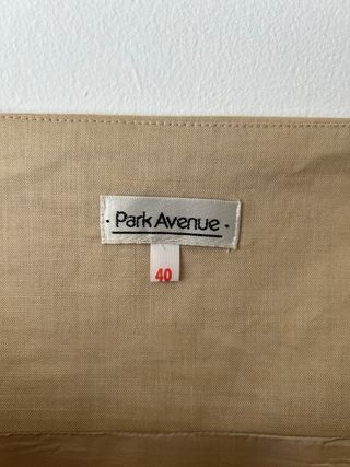 Falda de ramio beige con detalles