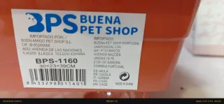 Jaula para pájaros blanca y marrón nieva