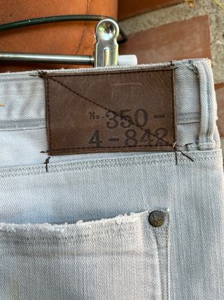 Pantalón pitillo gris largo