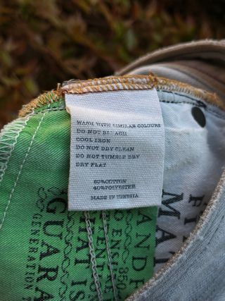 Pantalón pitillo gris largo