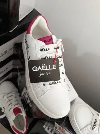 Sneakers bambina Gaelle bianche con fucsia