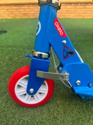 Patinete Oxelo azul y rojo