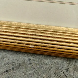 Stampa con cornice dorata