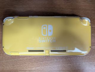 Nintendo Switch Lite Amarilla + Extras