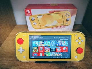 Nintendo Switch Lite Amarilla + Extras
