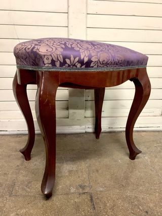 Banqueta antigua de piano.