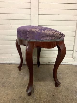 Banqueta antigua de piano.