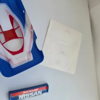 Stock de FÁBRICA Nissan Dunlop SRS Scalextric