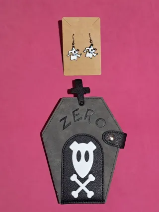 Cartera ataúd Zero y pendientes Zero