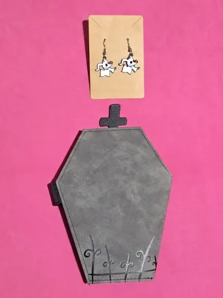 Cartera ataúd Zero y pendientes Zero
