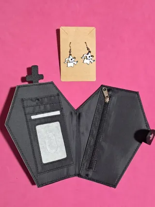 Cartera ataúd Zero y pendientes Zero