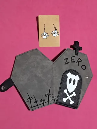 Cartera ataúd Zero y pendientes Zero
