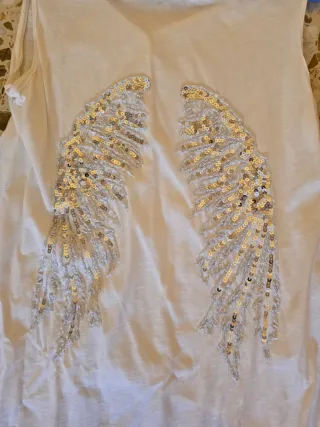 Camiseta tirantes con cola blanca