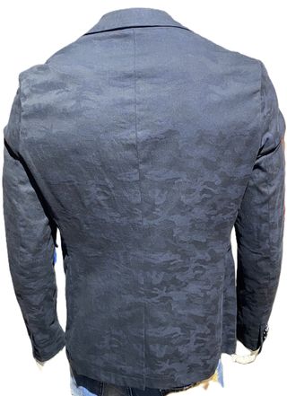 Americana de DR&N Do Rego & Novoa en negro