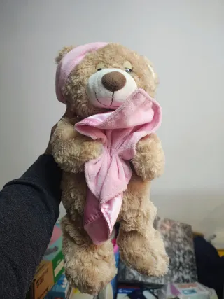 Ursinho de peluche rosa