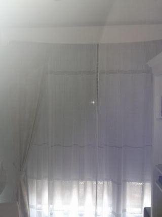 Cortina visillo y caídas tela