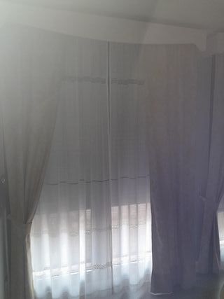 Cortina visillo y caídas tela