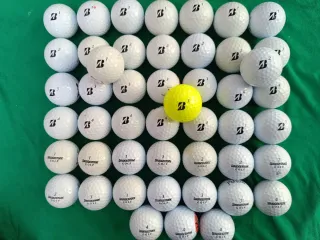 48 Bolas de golf Bridgestone, usadas. Buen estado.