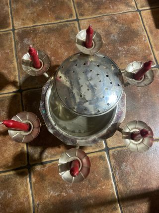 Centro de mesa antiguo con candelabros