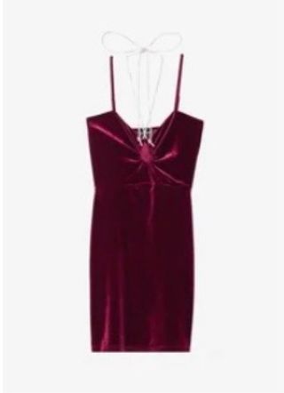 Vestito rosso in velluto con fiocco