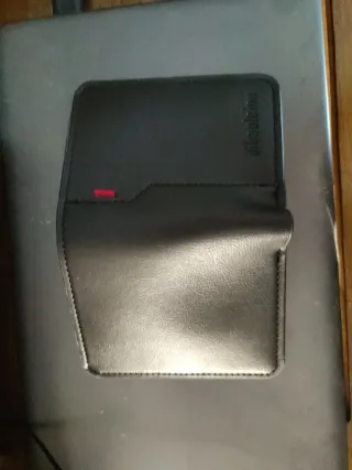 Cartera pequeña hombre negra