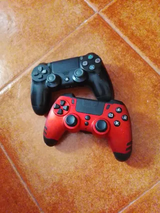 PS4 (PlayStation 4) con 9 juegos, 2 mandos, camara