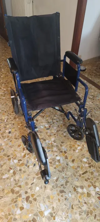 Cadira de rodes plegable