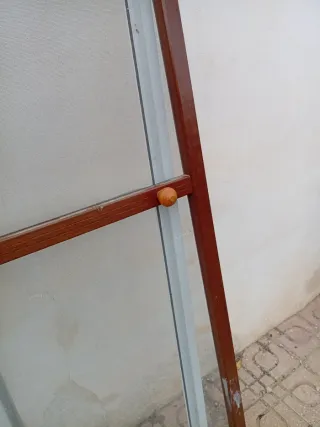 Puerta mosquitera con marco