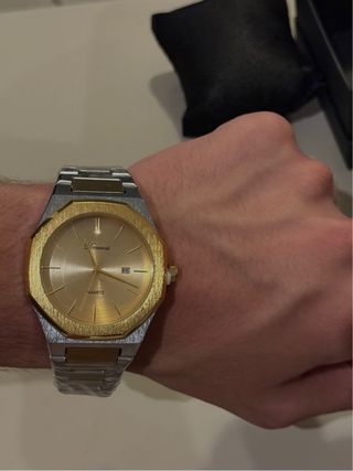Reloj Dorado y Plateado