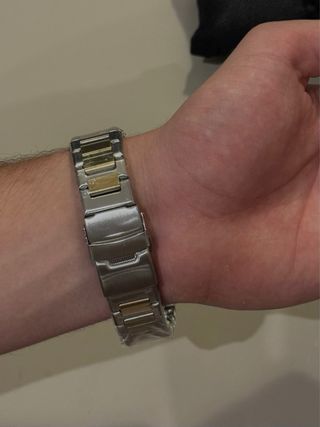 Reloj Dorado y Plateado