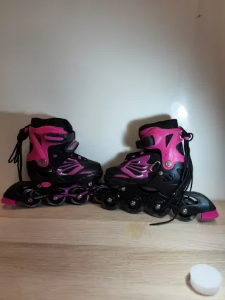 Patines en línea rosas y negros