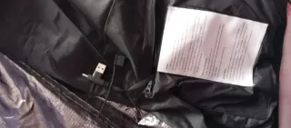 Cazadora térmica negra con capucha