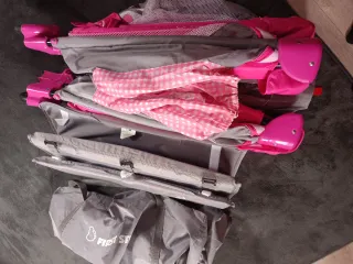 Cuna de viaje rosa , first step