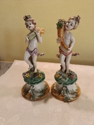 Coppie di statuine vintage in ceramica