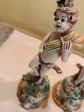 Coppie di statuine vintage in ceramica