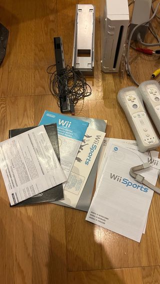 Nintendo Wii + Wii Sports + Wii Wheel