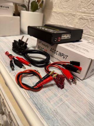 Cargador y descargador de equilibrio