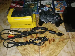 PlayStation 2 Fat 5004 con giochi e accessori
