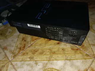 PlayStation 2 Fat 5004 con giochi e accessori