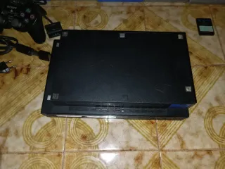 PlayStation 2 Fat 5004 con giochi e accessori