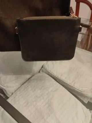 Bolso de mano y neceser de piel