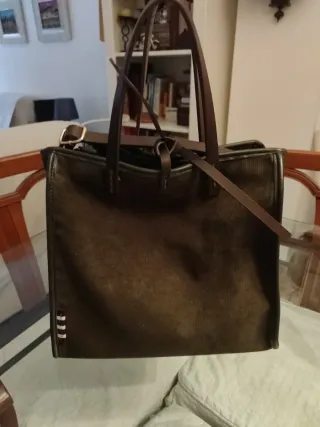 Bolso de mano y neceser de piel