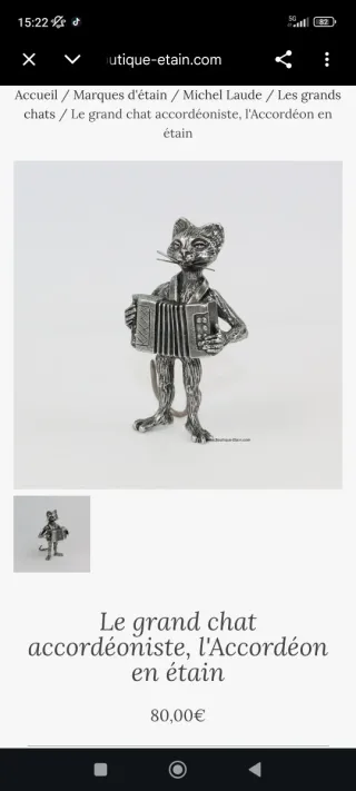 Figura gato con acordeón