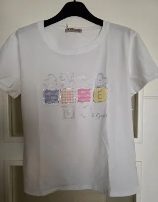 Camiseta IMPRESION blanca con pedrería  L/ XL