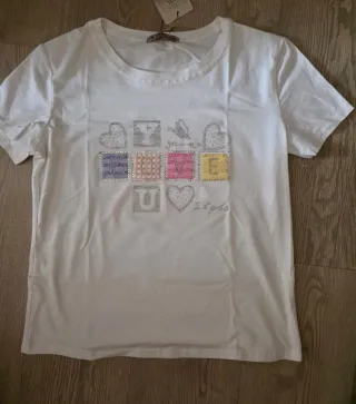 Camiseta IMPRESION blanca con pedrería  L/ XL
