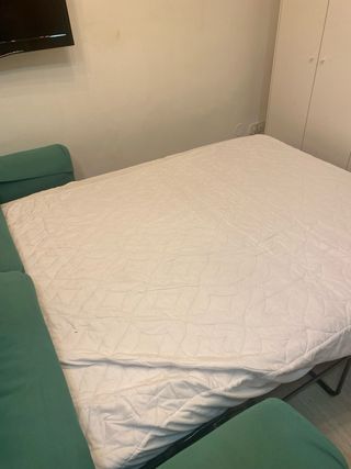 Sofá cama verde agua